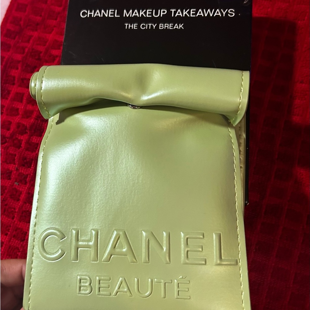 CHANEL lime green embossed faux-leather makeup pouch